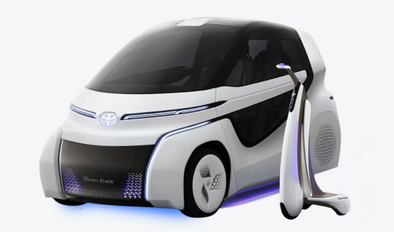 Renders of two futuristic Toyota concept vehicles: a two-person vehicle and an electric scooter.