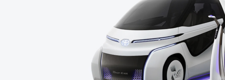 Renders of two futuristic Toyota concept vehicles: a two-person vehicle and an electric scooter.