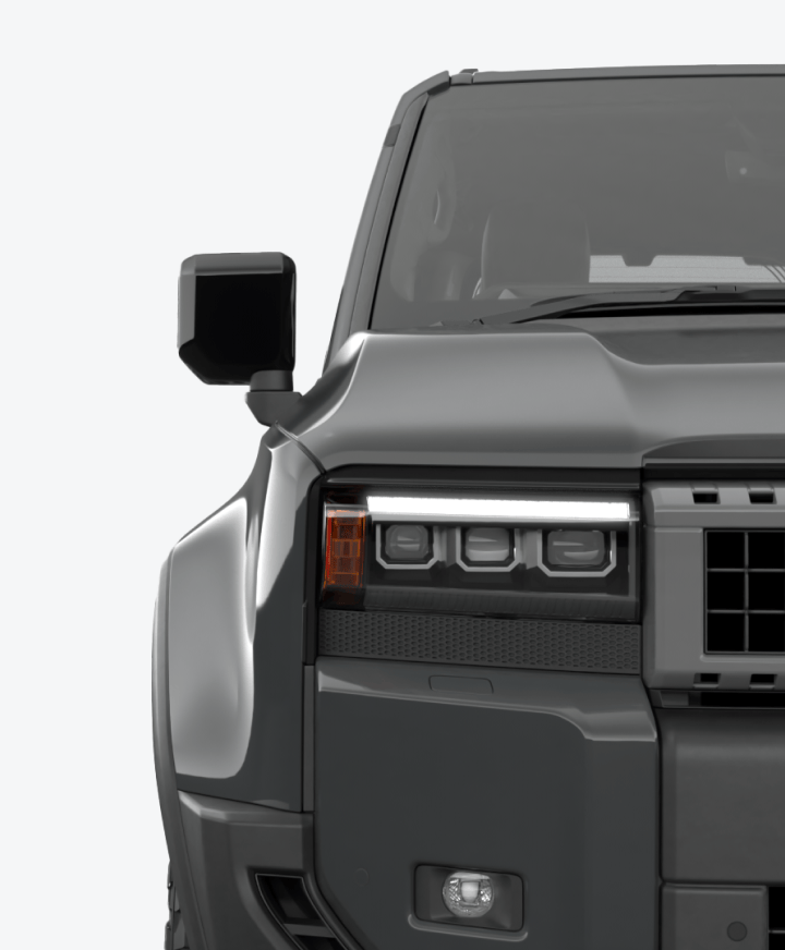 Front grille of a black 2024 Toyota Prado.