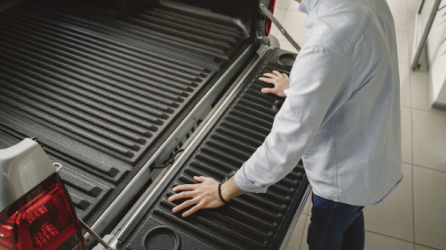 Person checking out HiLux Tray