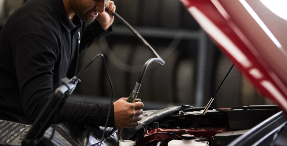 Toyota Technician inspecting a vehicle